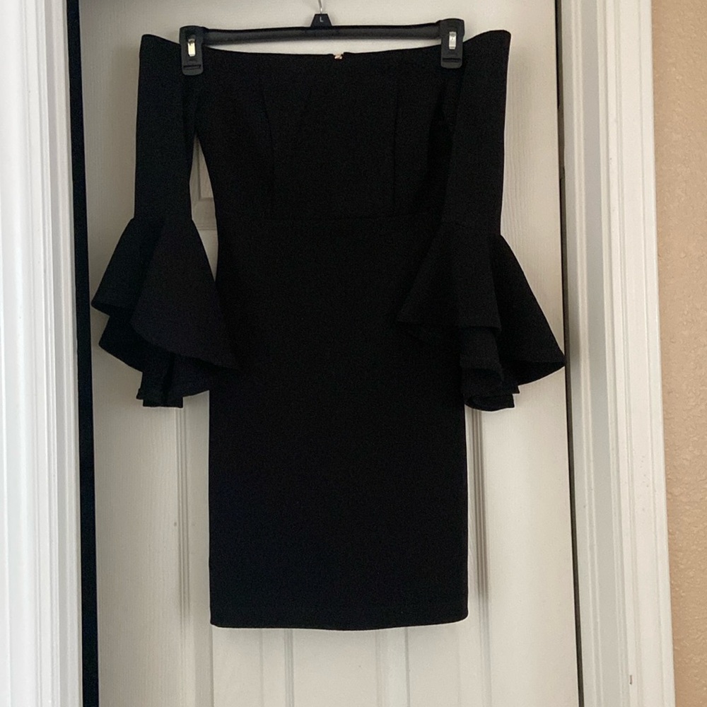 Black mini dress, perfect for any event! Only work once.